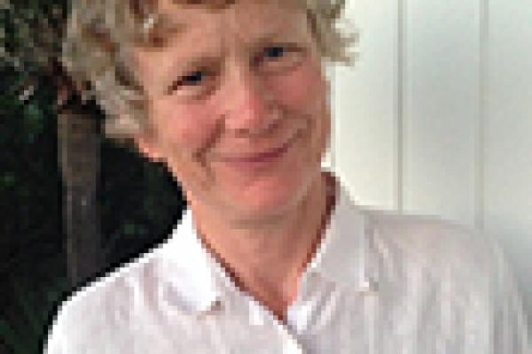 woman grinning towards camera